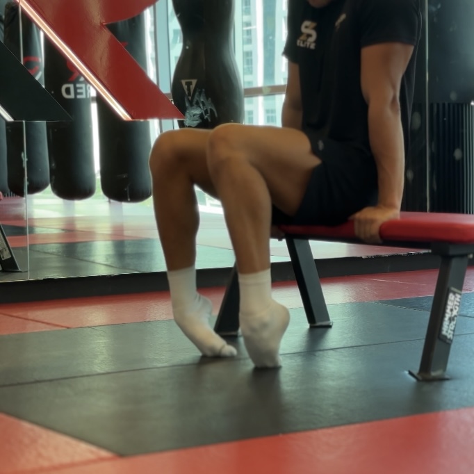 Seated calf and ankle strength work on a bench